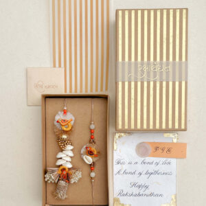 Sparrow Rakhi Lumba and Roli Chawal Gift Set in Gold Striped Box by Pandora Gift Co for Rakshabandhan