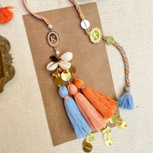 Kiran Designer Rakhi and Lumba with Gold Accents and Tassels – Rakshabandhan Gift Box by Pandora Gift Co
